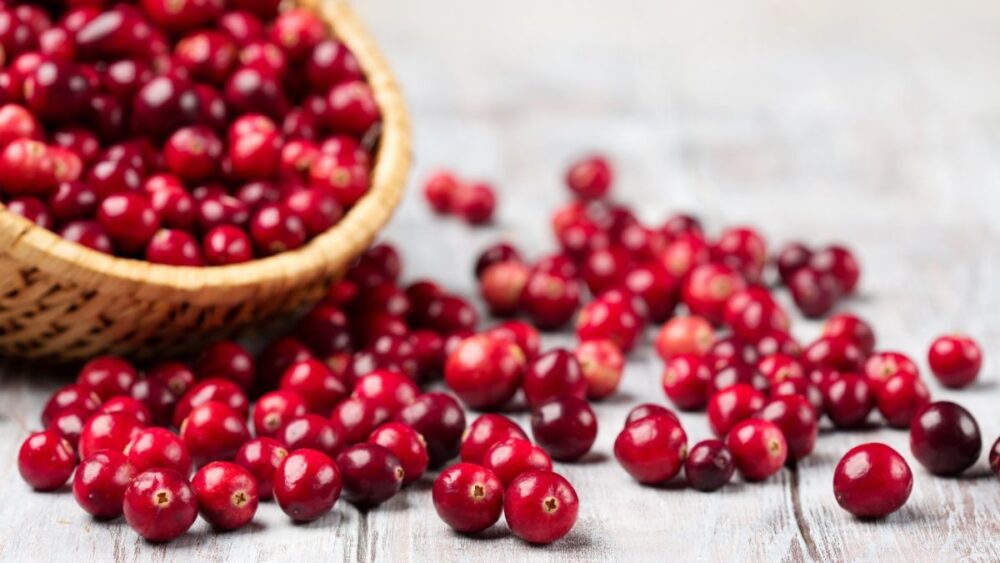 Cranberries on a table depicting can diabetics eat cranberries